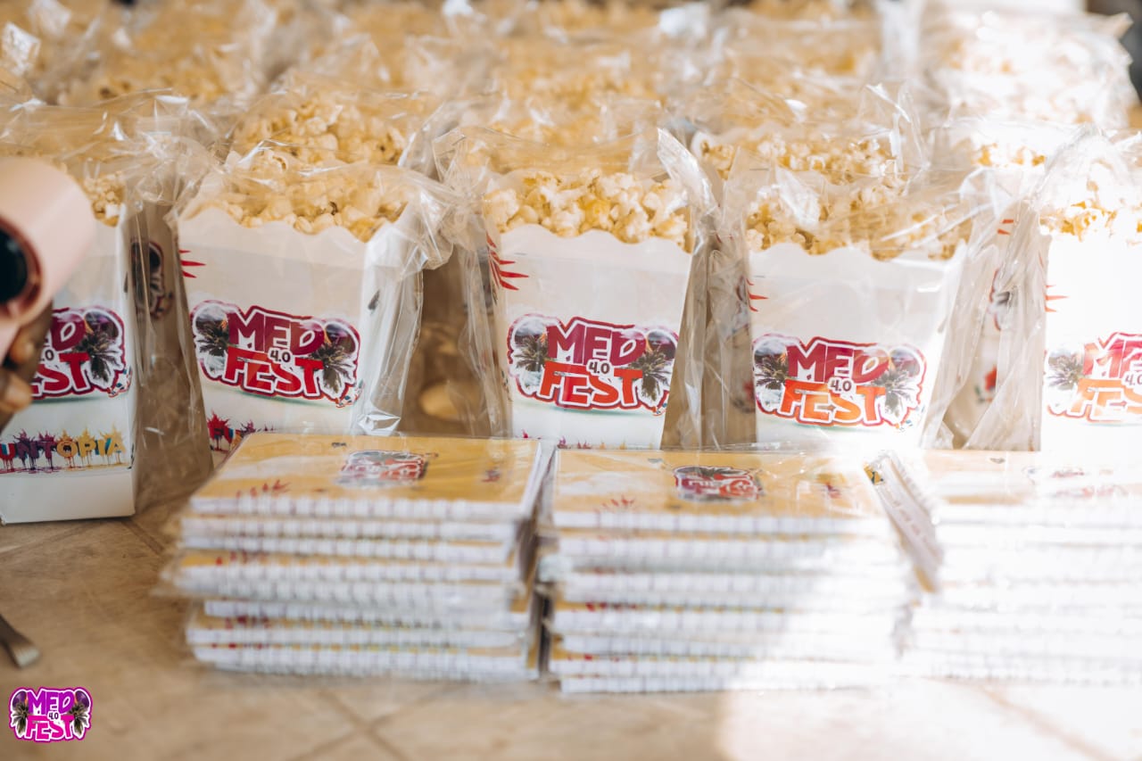 Popcorn boxes lined up on a table